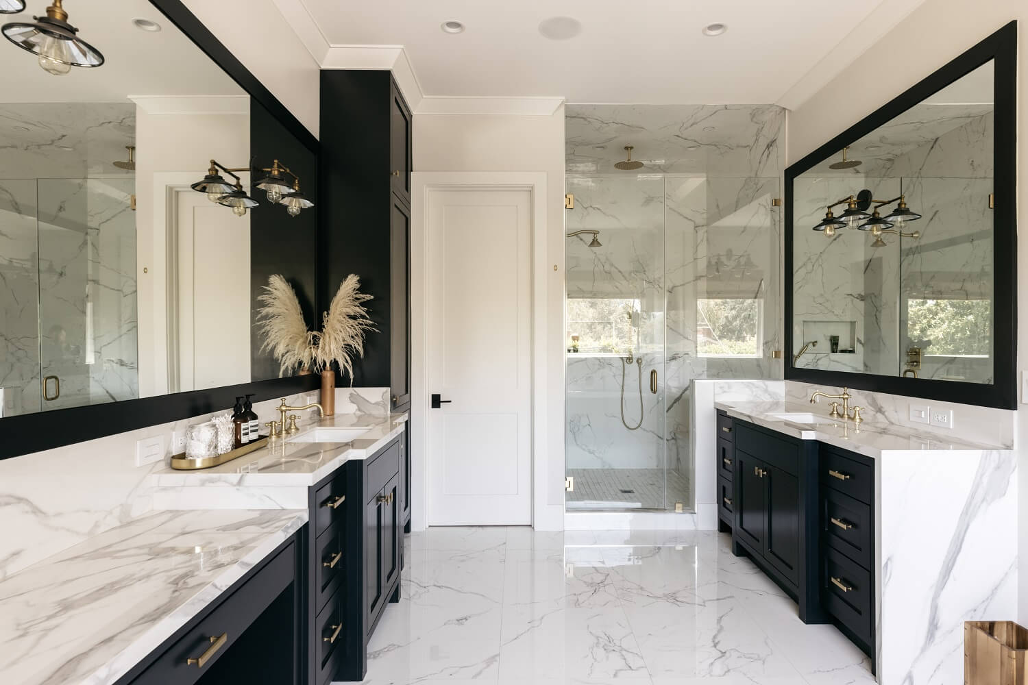 master-bathroom-blue-cabinets-marble-tiles-daveed-diggs-emmy-raver-lampman-nordroom