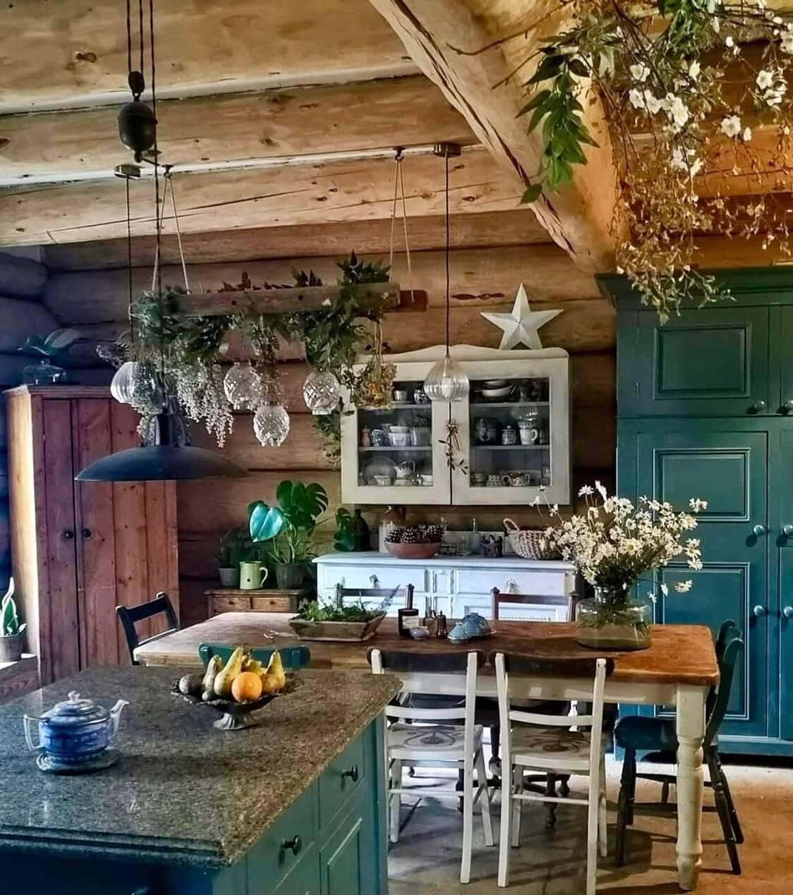 rustic-kitchen-log-house-blue-cabinets-dining-space-nordroom