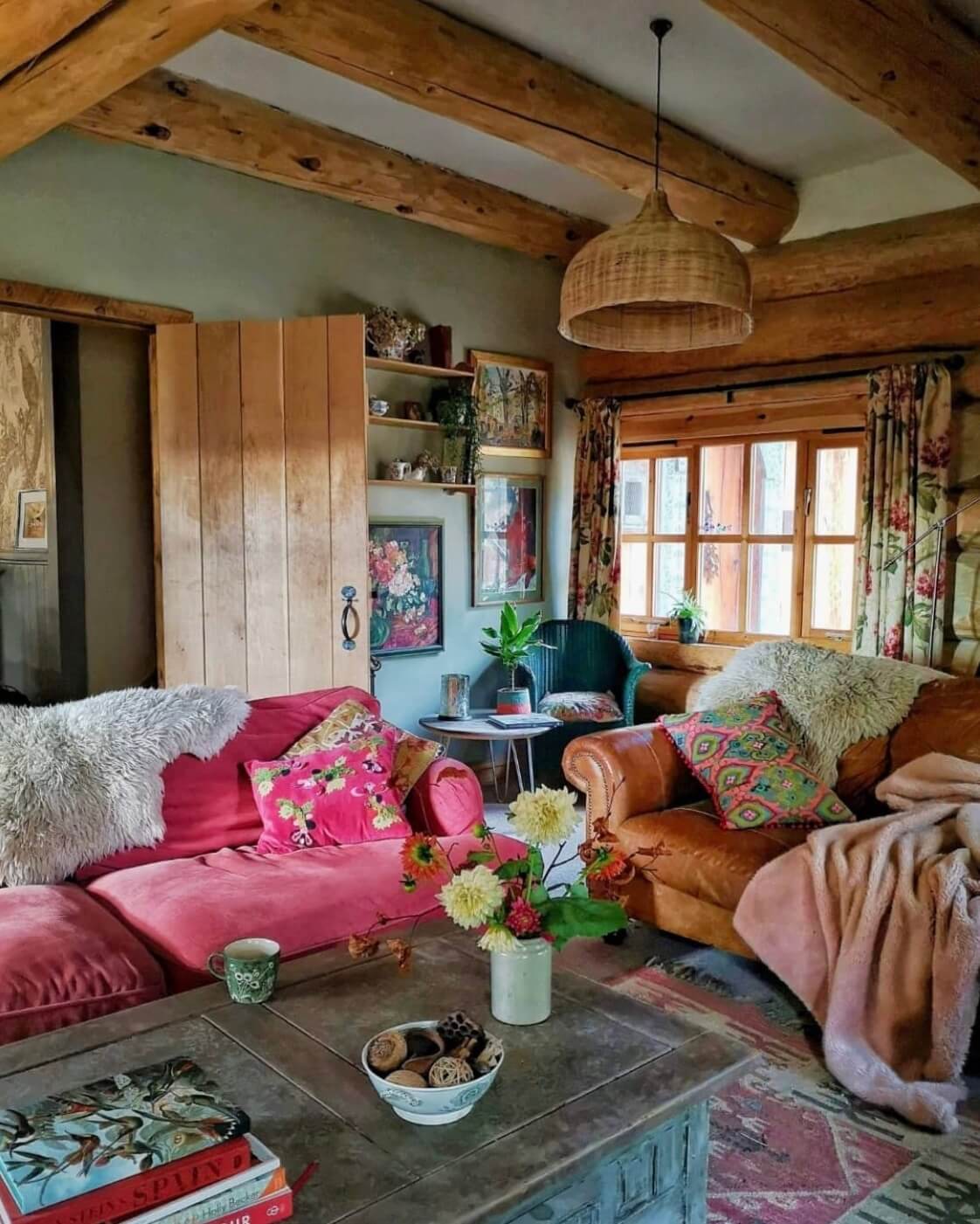 sitting-room-pink-sofa-exposed-beams-log-house-scotland-nordroom