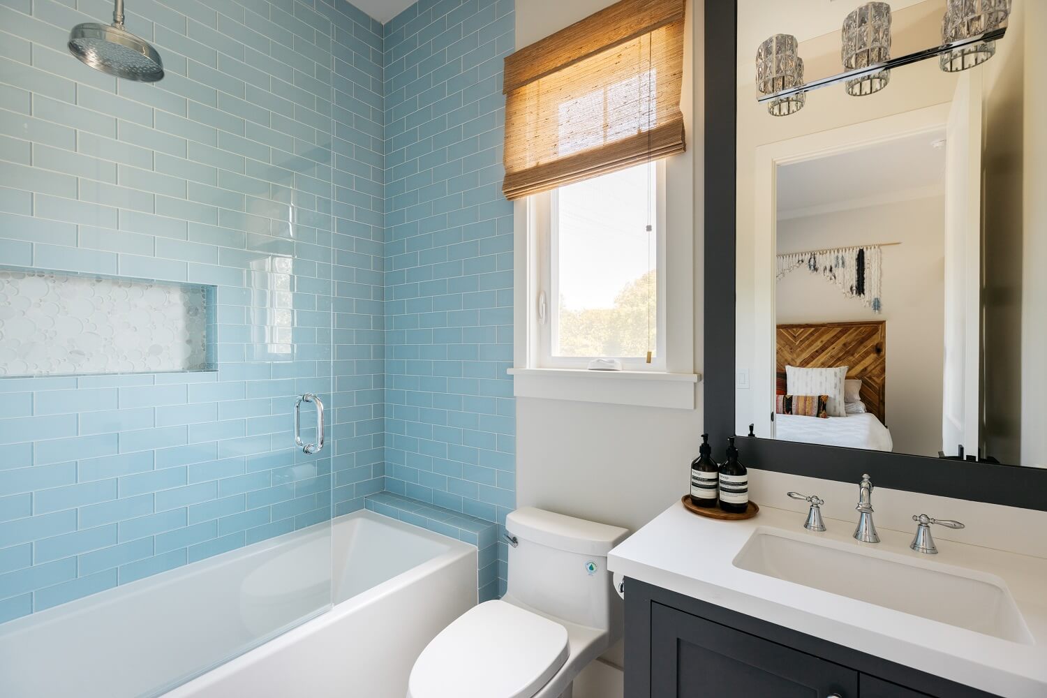 small-bathroom-tub-blue-tiles-daveed-diggs-emmy-raver-lampman-nordroom