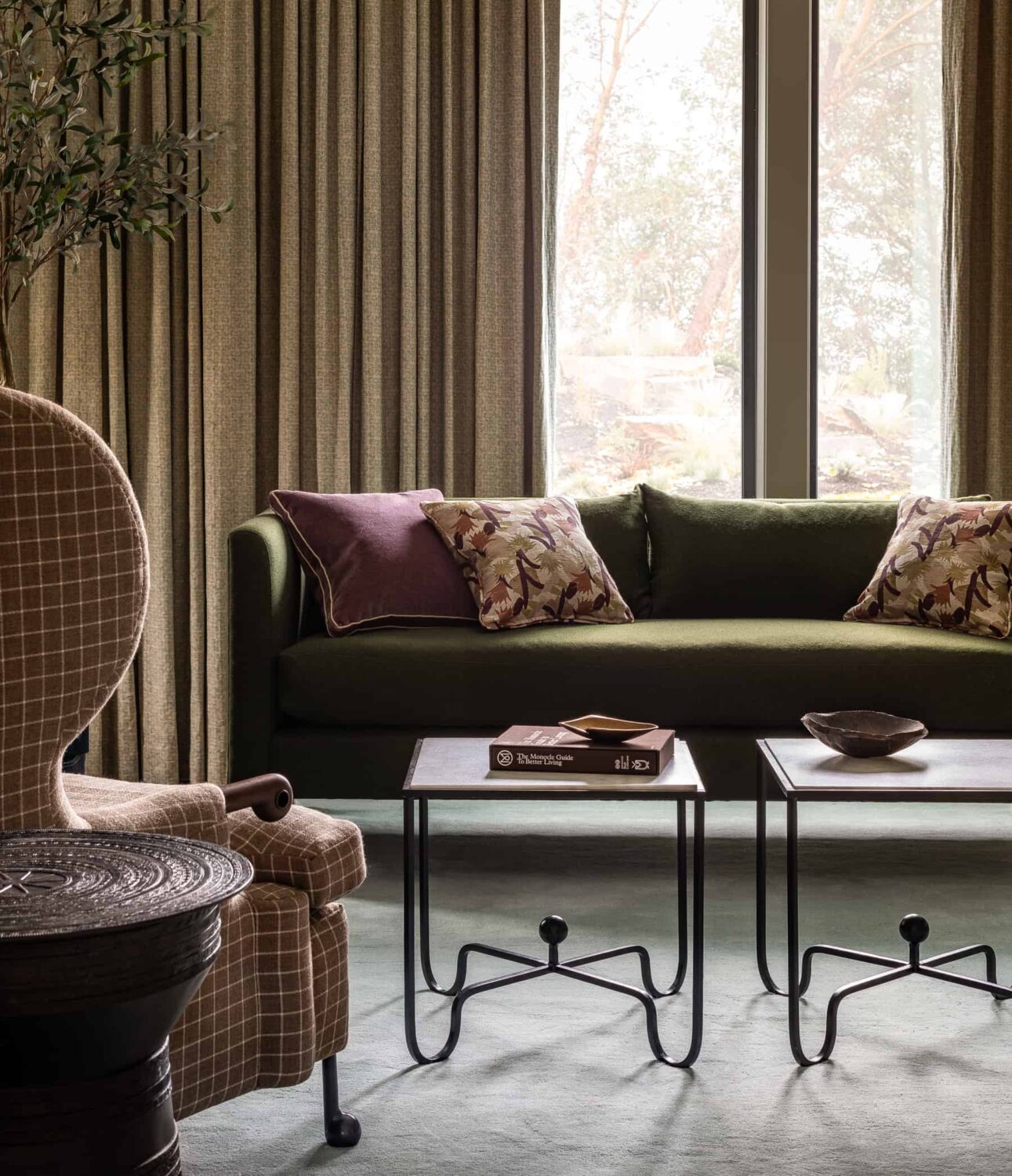 Heidi-Caillier-Design-luxury-interior-designer-primary-bedroom-seating-area-green-sofa