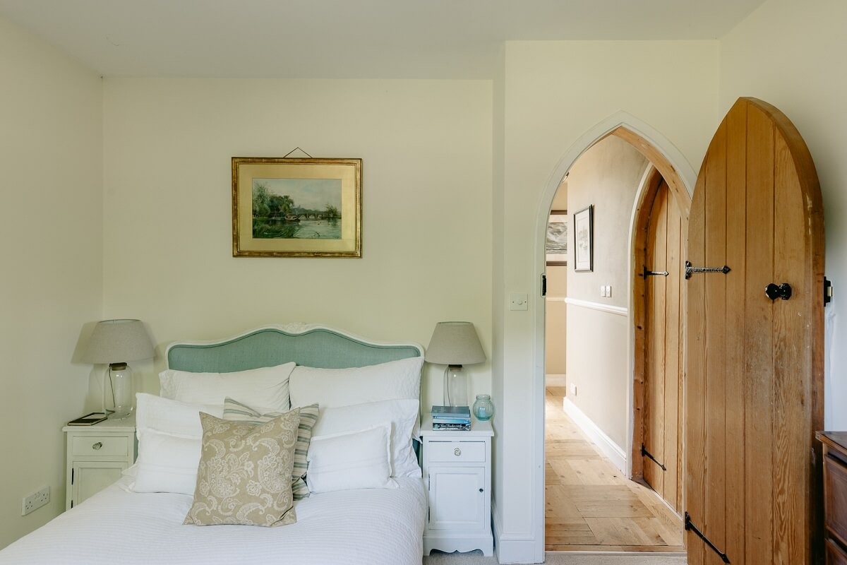 bedroom-arched-wooden-door-church-conversion-nordroom