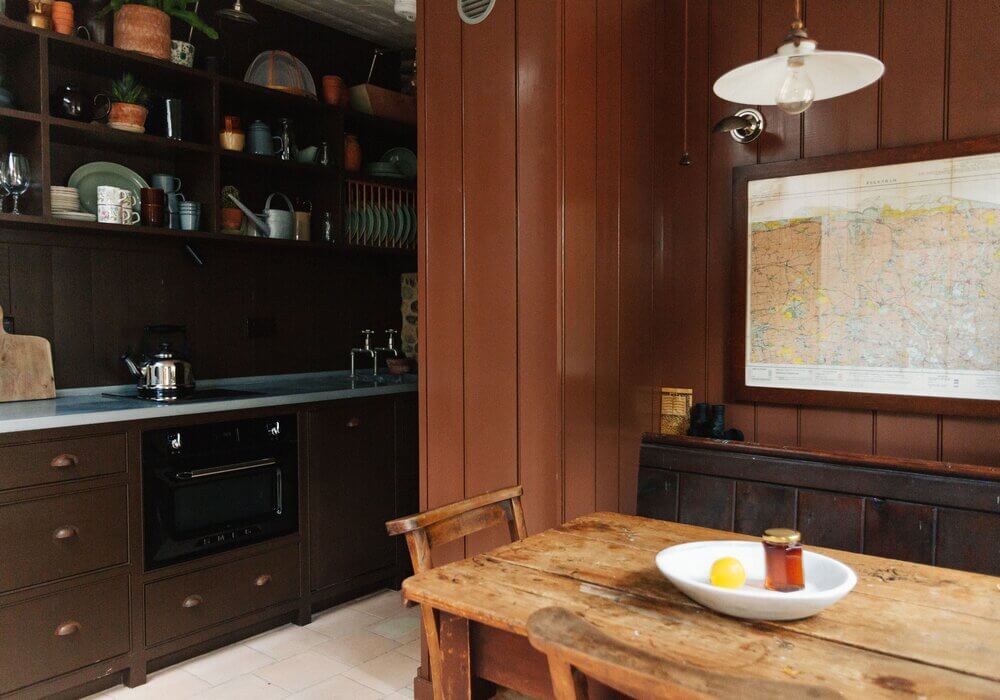 brown-cottage-kitchen-open-cabinets-nordroom