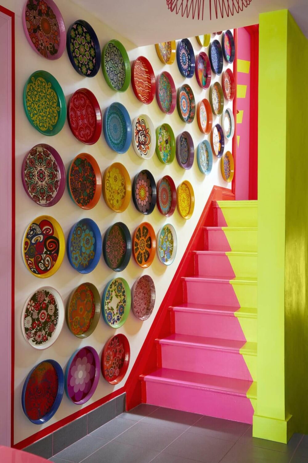 pink-yellow-staircase-plates-wall-decor-nordroom