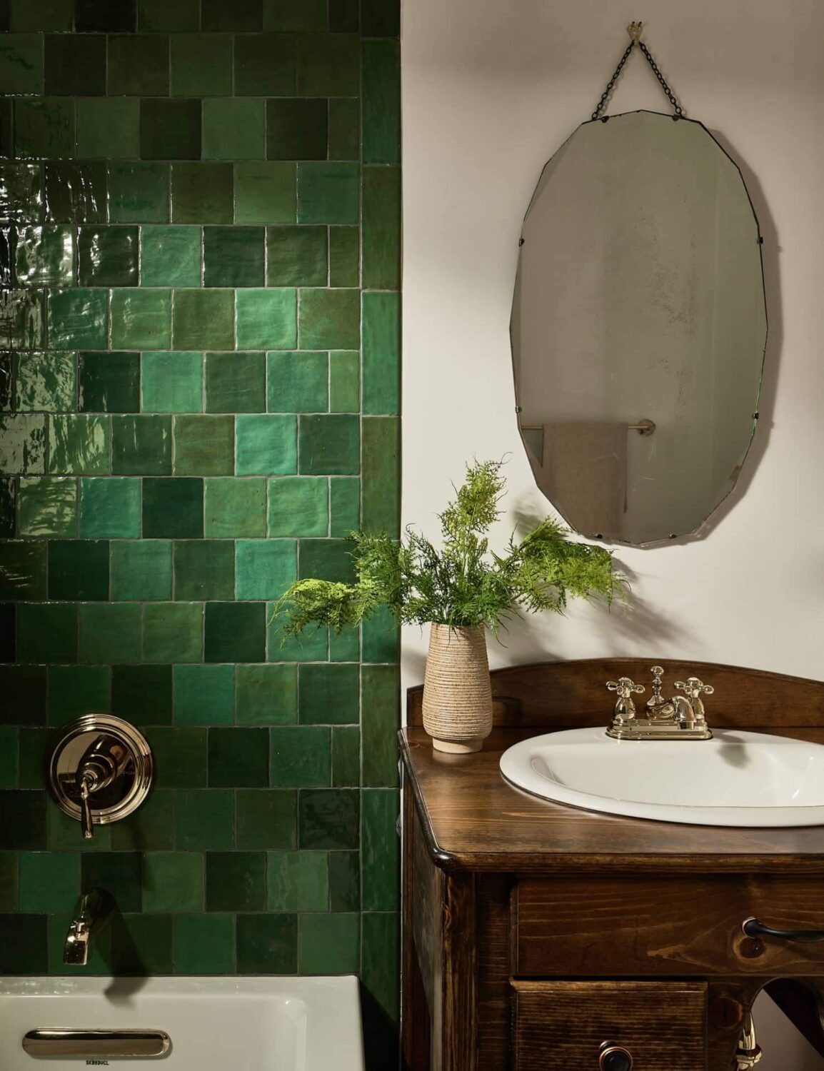 bathroom-green-tiles-wooden-vanity-brass-fittings-nordroom