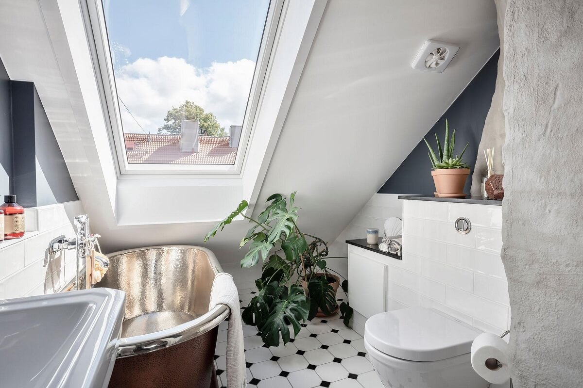 bathroom-sloped-ceiling-gray-walls-copper-bath-nordroom