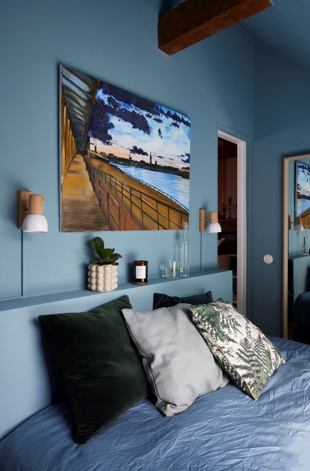 blue-attic-bedroom-storage-headboard-nordroom