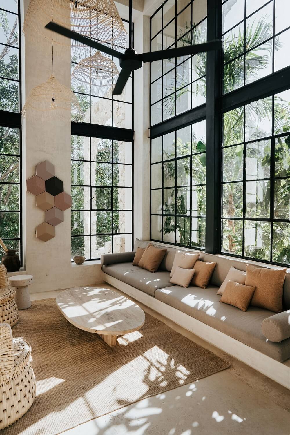 light-living-room-high-windows-natural-materials-nordroom