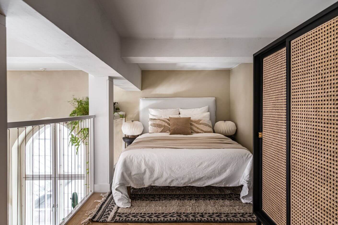 loft-bedroom-cane-wardrobe-beige-walls-nordroom
