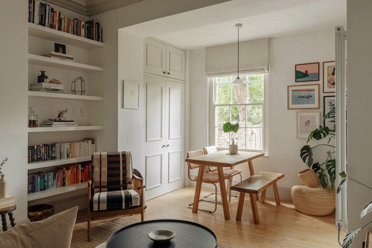 serene-sitting-room-dining-space-bookshelves-nordroom