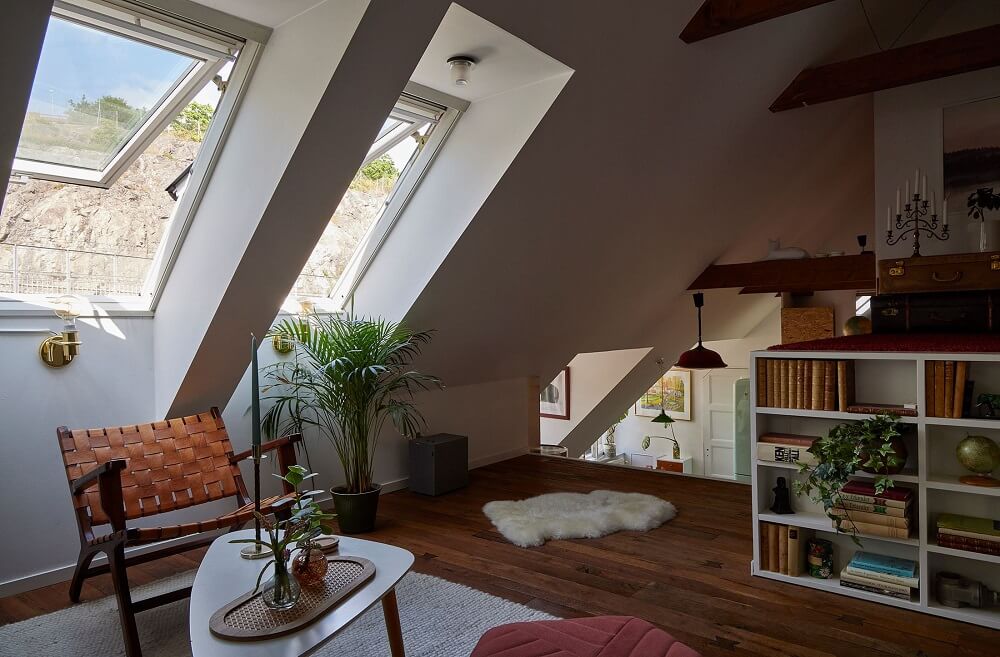 sitting-room-attic-apartment-sloped-ceiling-exposed-beams-nordroom