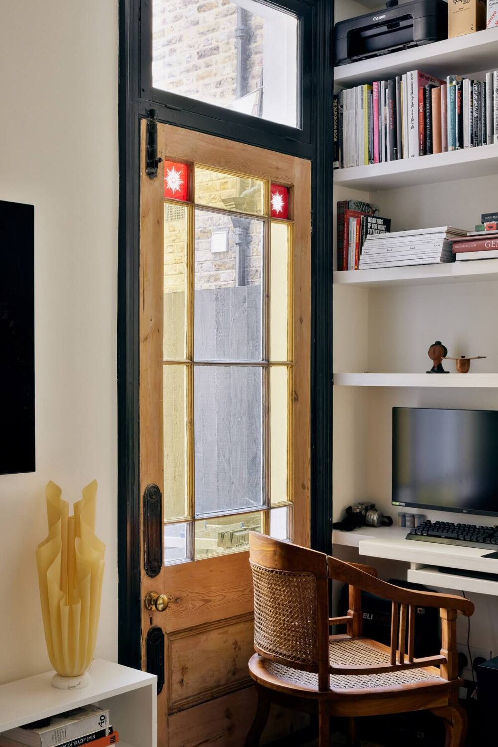 small-home-office-stained-glass-door-shelves-nordroom