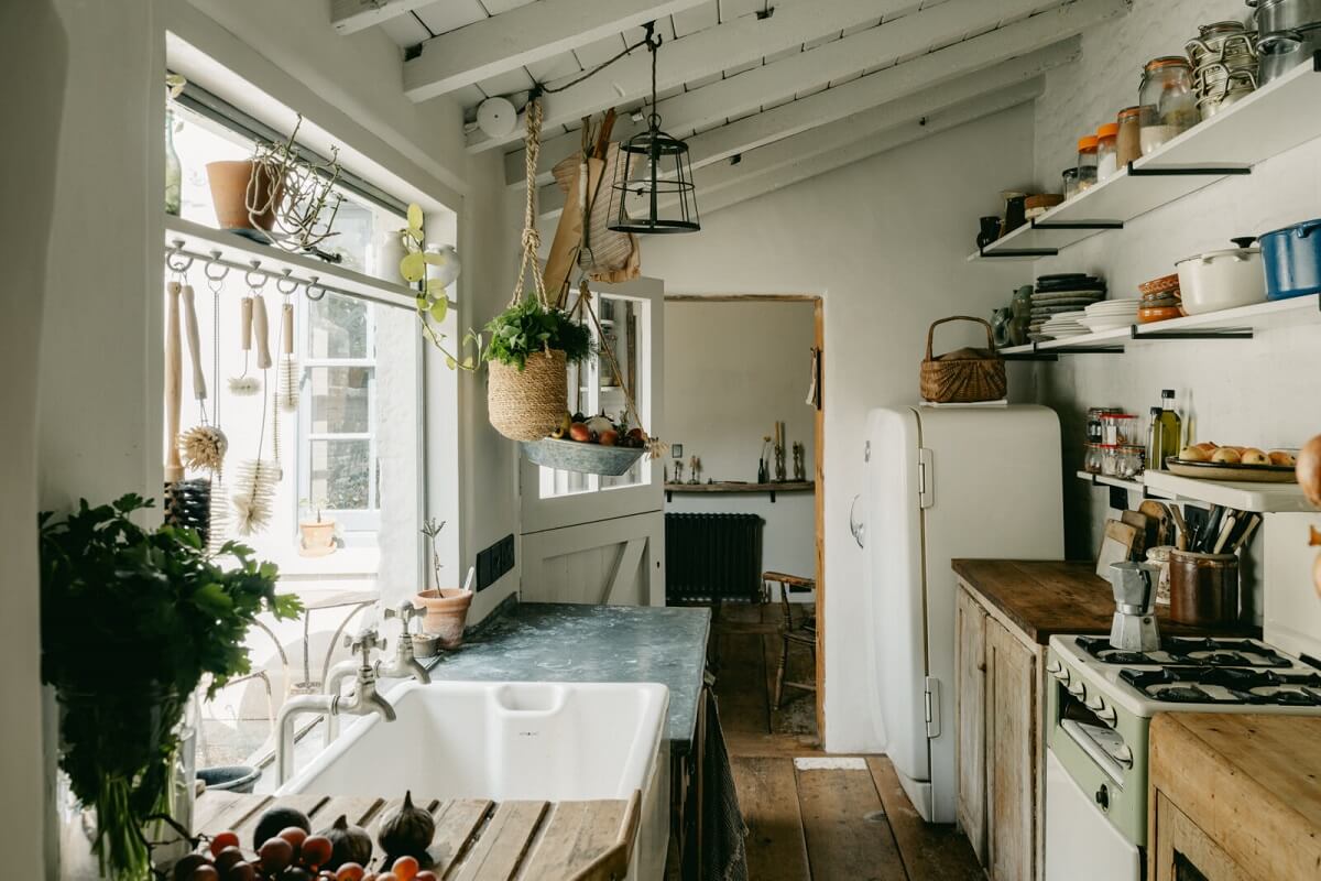 kitchen-wooden-beams-butler-sink-antique-units-open-shelves-nordroom