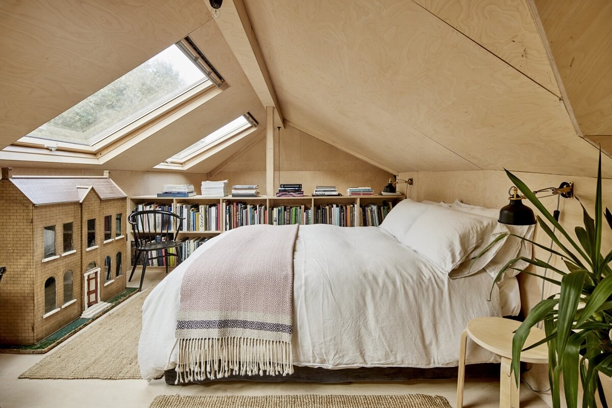 loft-bedroom-bookshelves-skylight-plywood-nordroom
