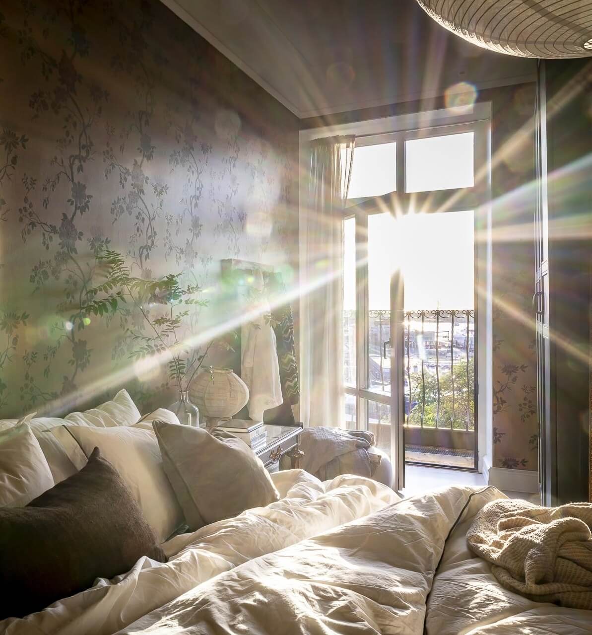 natural-light-master-bedroom-floral-wallpaper-nordroom
