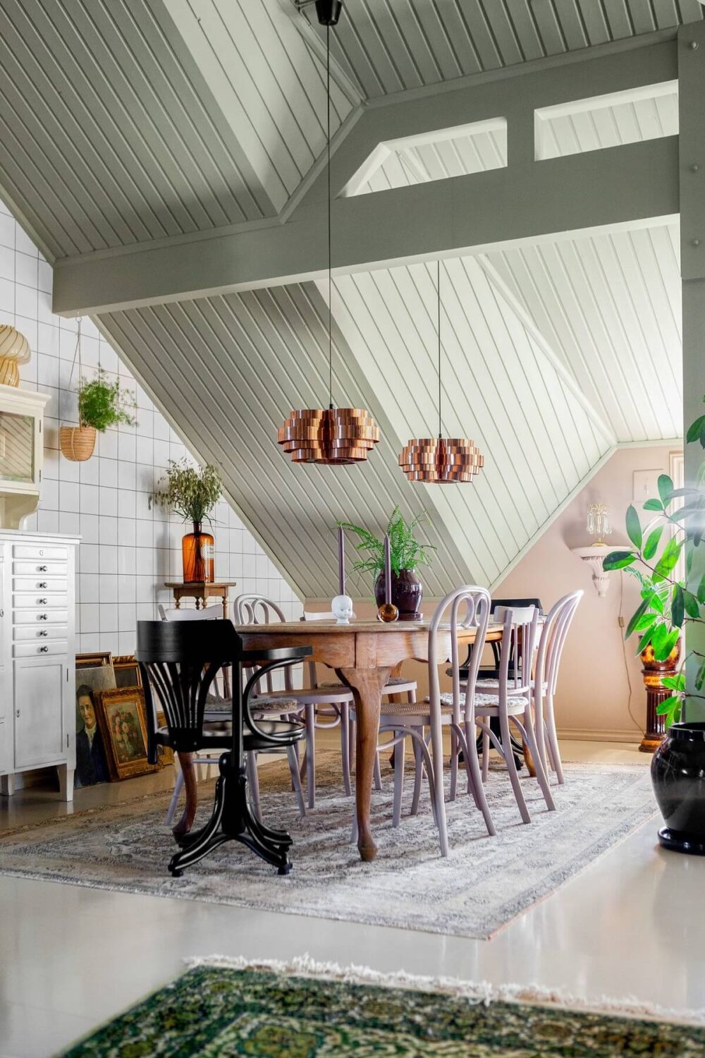 vintage-dining-space-slanted-ceiling-tiled-wall-nordroom