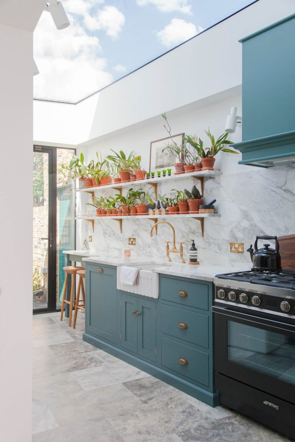 devol-kitchen-blue-cabinets-large-modern-roof-window-nordroom