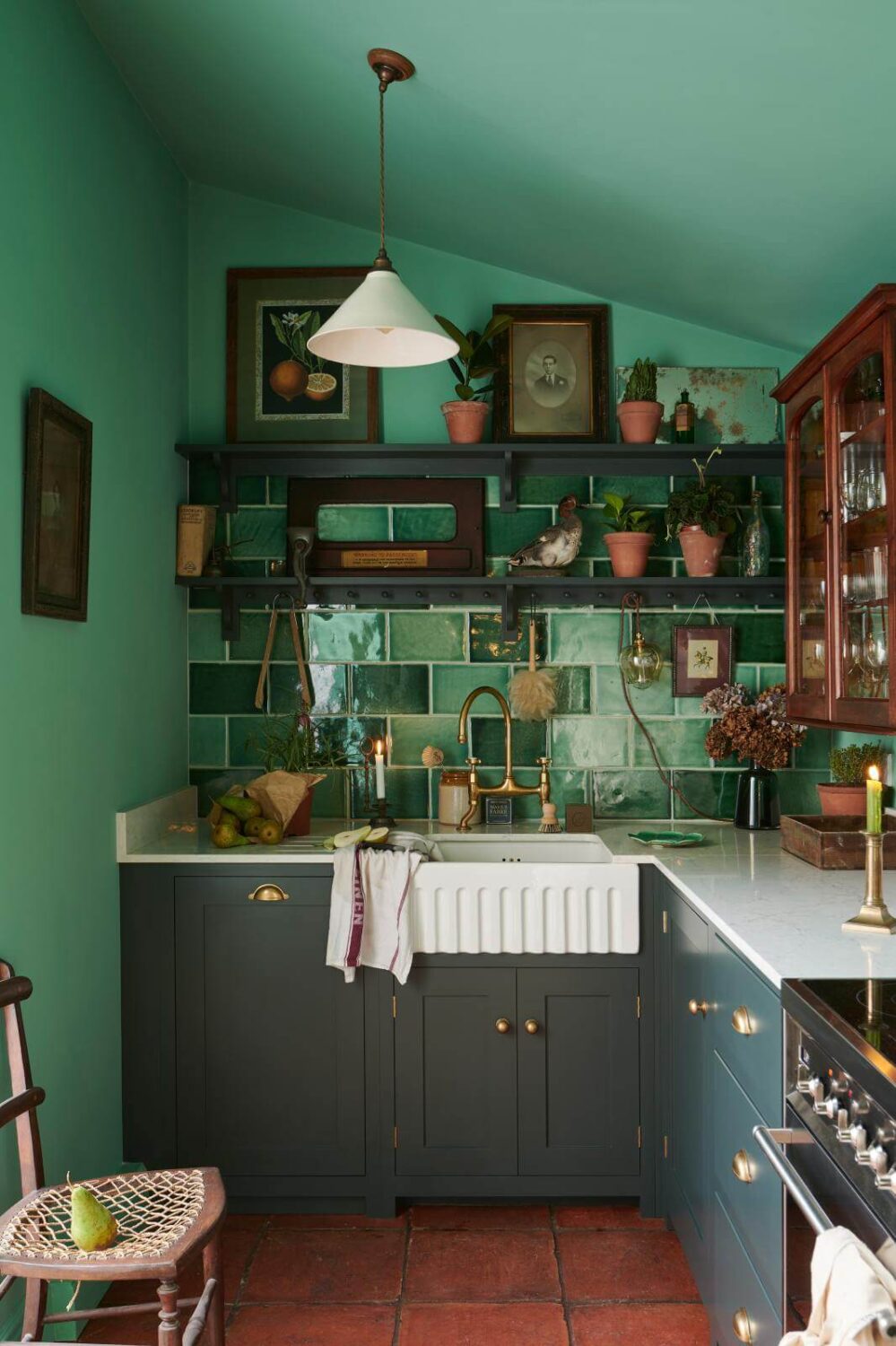 devol-kitchen-terracotta-floor-tiles-green-walls-nordroom