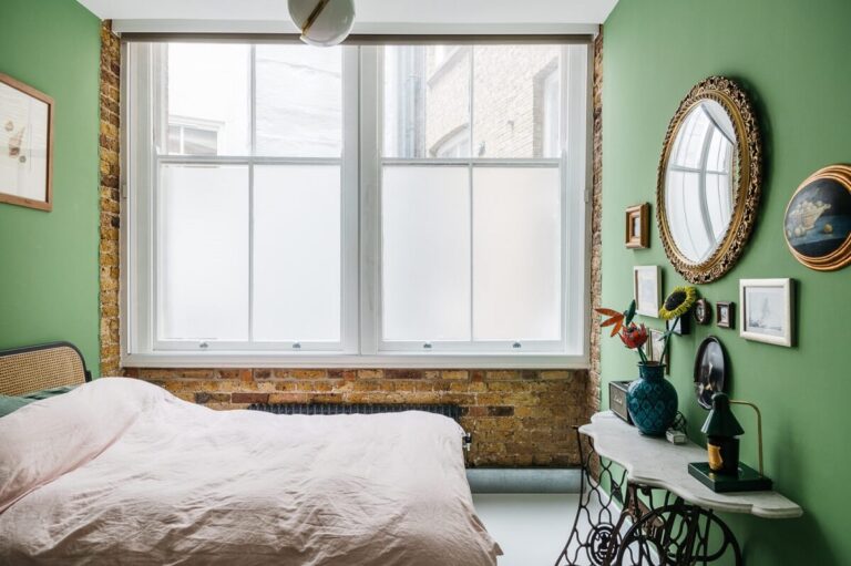 Image showcasing A Modern Apartment with Exposed Brick Walls and Color Accents - The ...