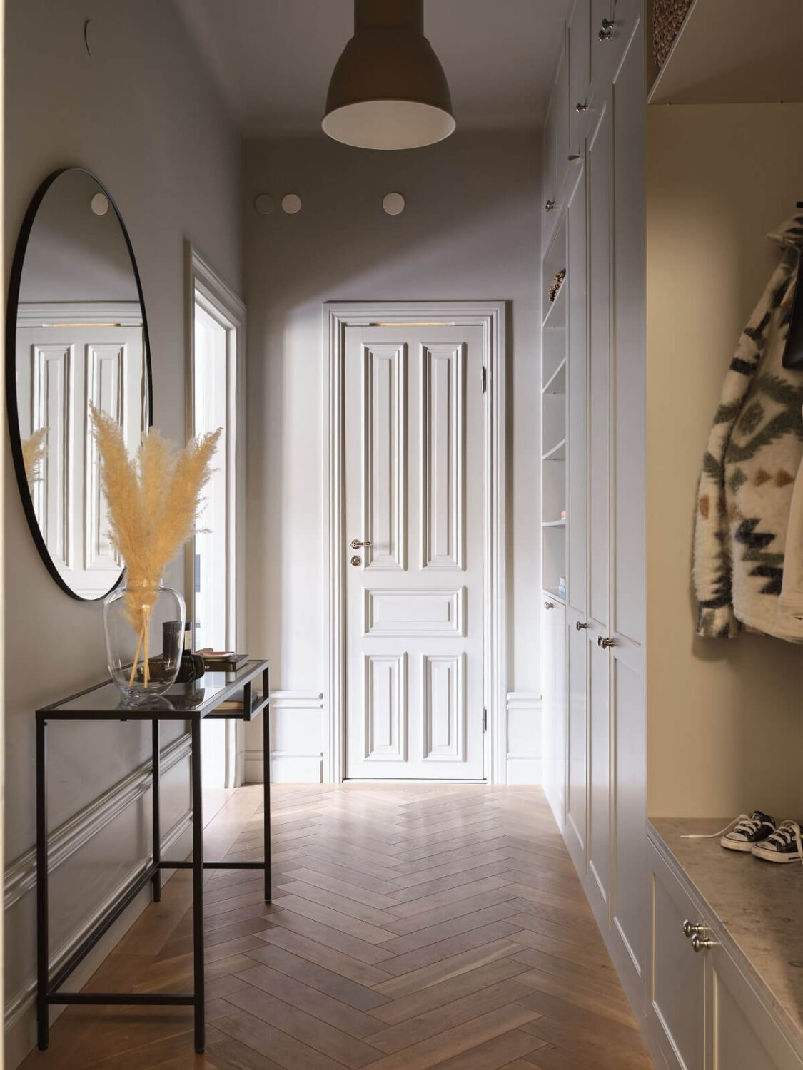hallway-built-in-cabinets-niche-coat-storage-round-mirror-nordroom