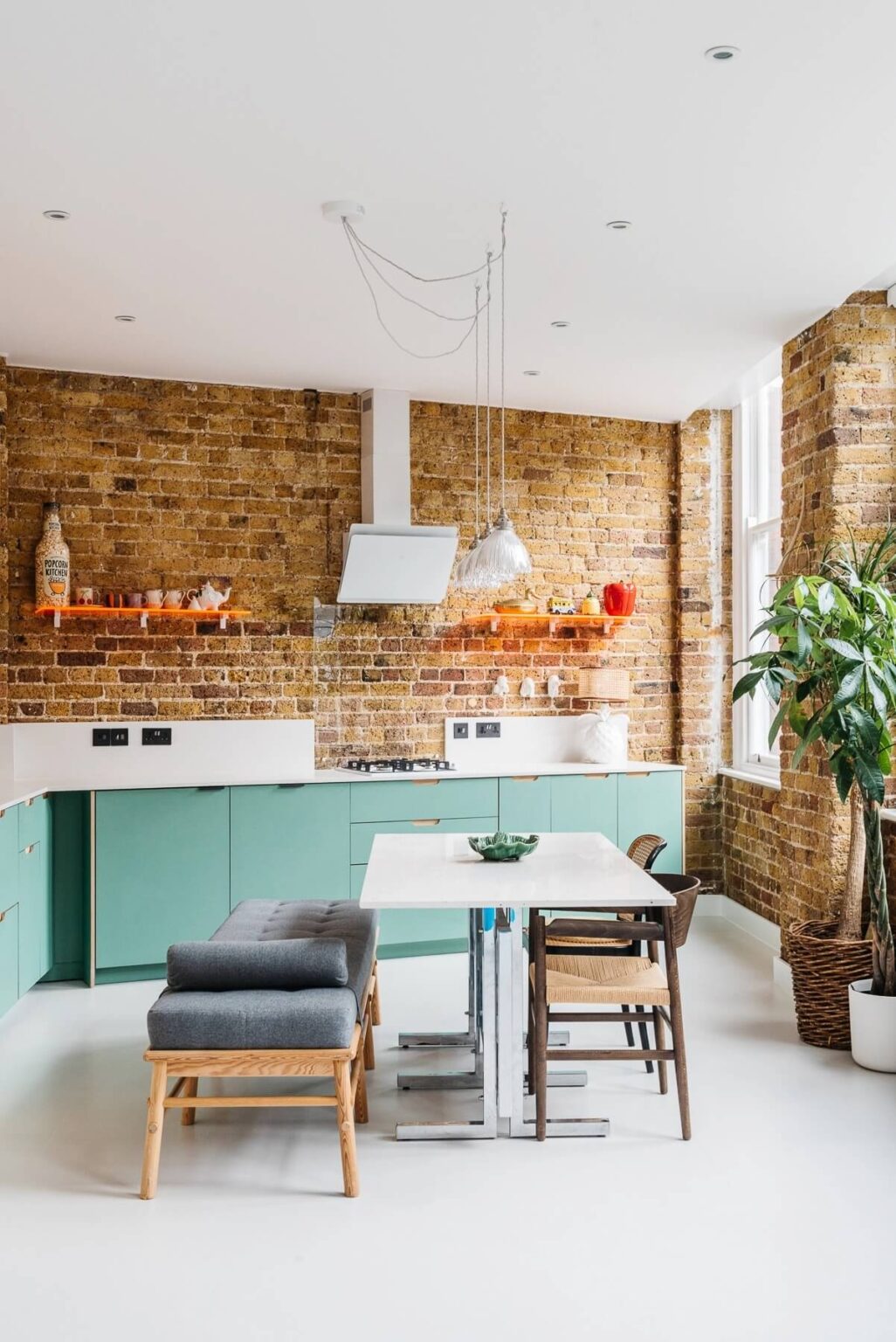 Stunning Green Apartment Decor For Apartments With Exposed Brick image