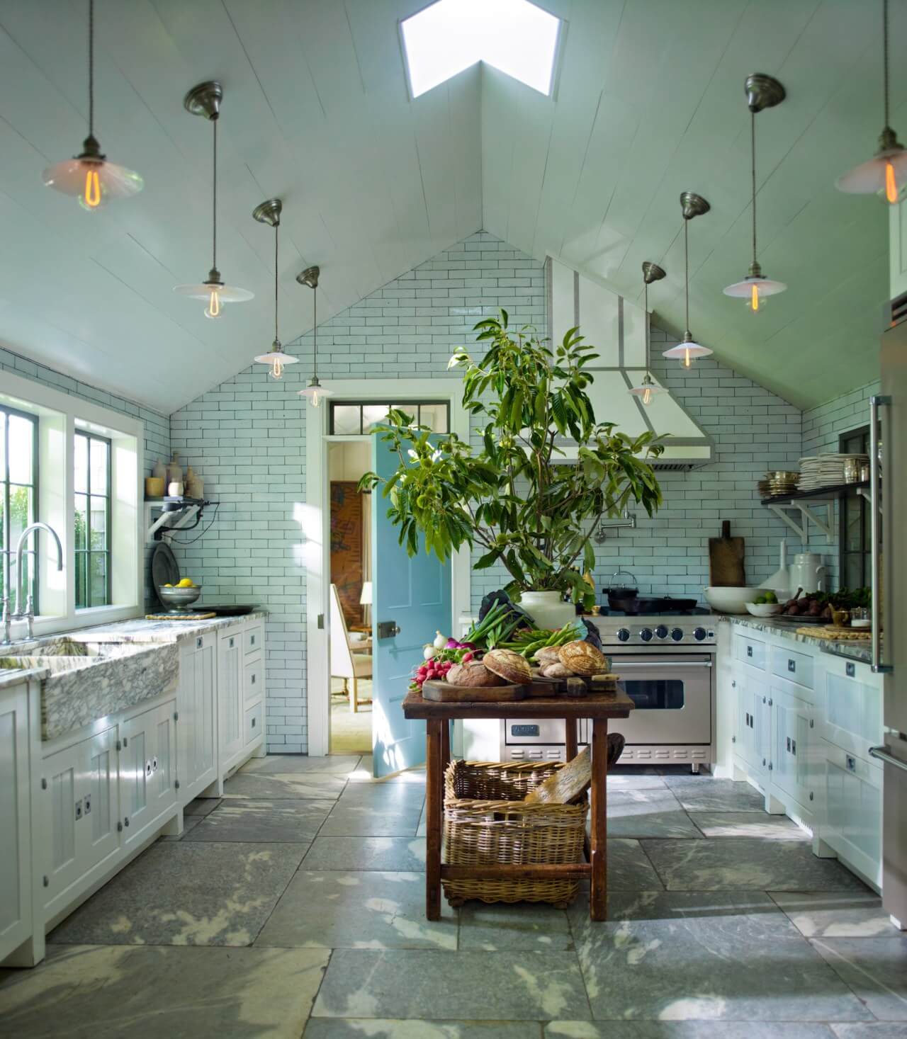 large-country-kitchen-stone-floor-small-skylight-island-nordroom