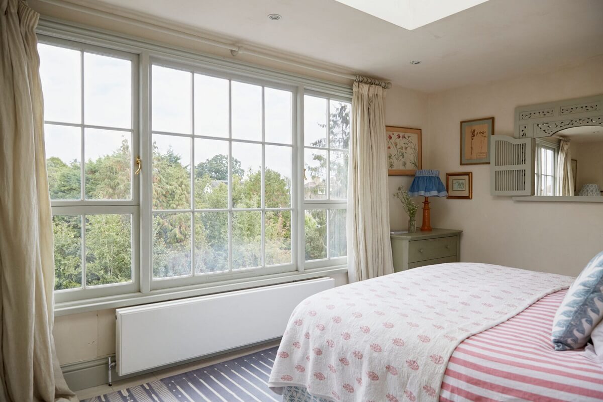 light-bedroom-beige-walls-skylight-nordroom