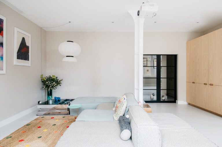 Picture of A Modern Apartment with Exposed Brick Walls and Color Accents - The ...