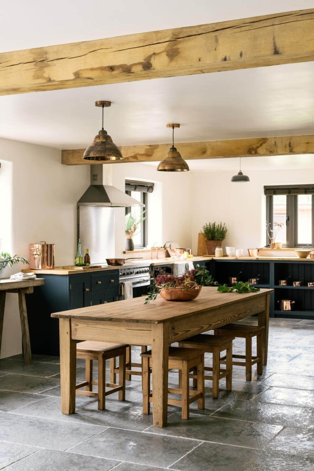 limestone-floor-kitchen-rustic-island-exposed-beams-nordroom