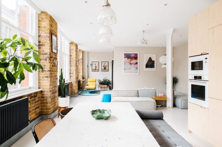 A Modern Apartment with Exposed Brick Walls and Color Accents - The ...