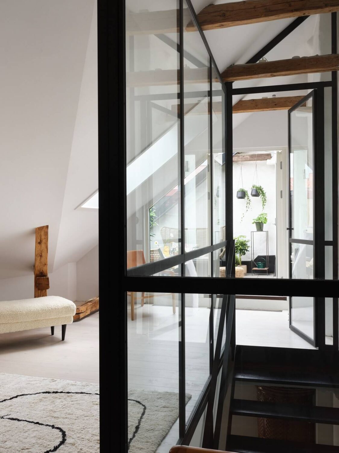 steel-glass-wall-staircase-attic-bedroom-nordroom