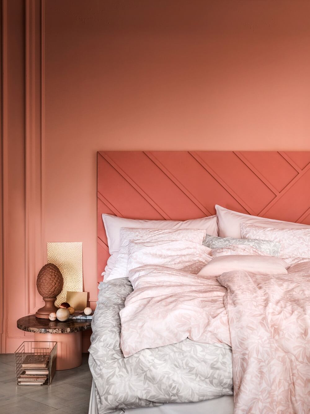 tone on tone decorating coral pink headboard blush pink walls bedroom nordroom