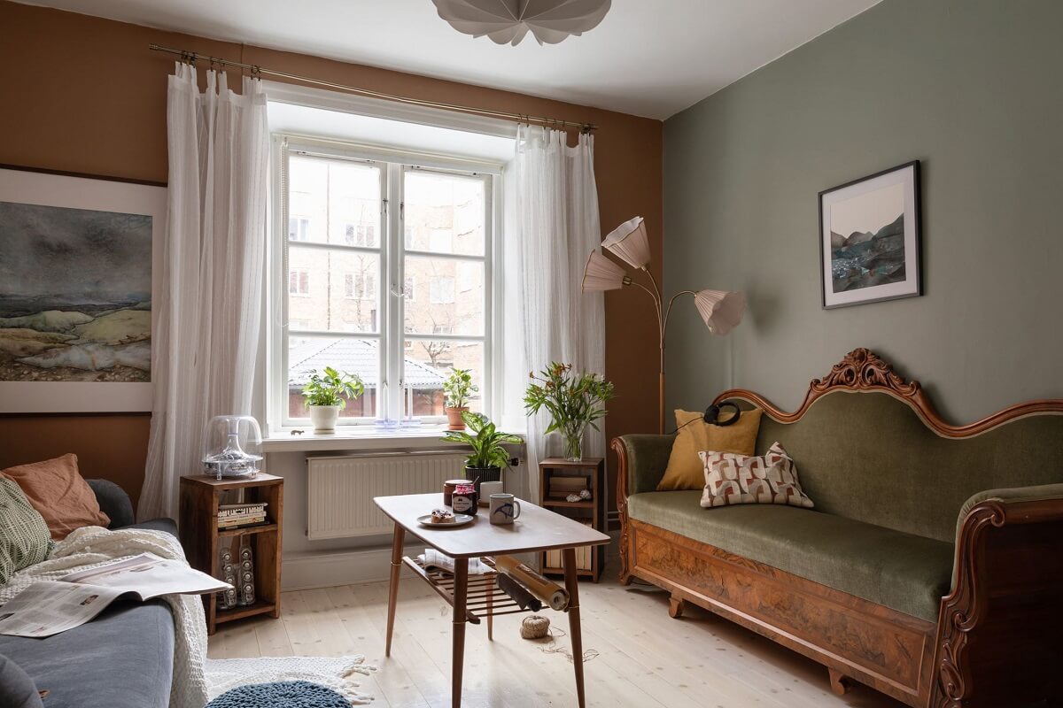 antique-wooden-sofa-green-velvet-warm-sitting-room-nordroom