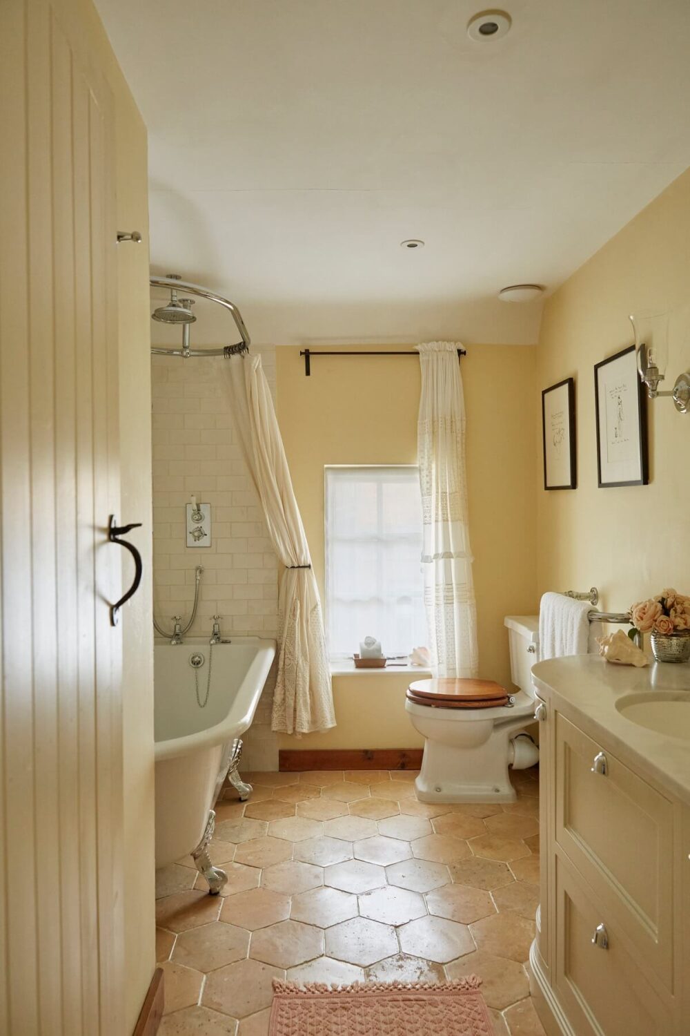 bathroom-clawfoot-bath-pale-pink-walls-hexagon-floor-tiles-nordrom