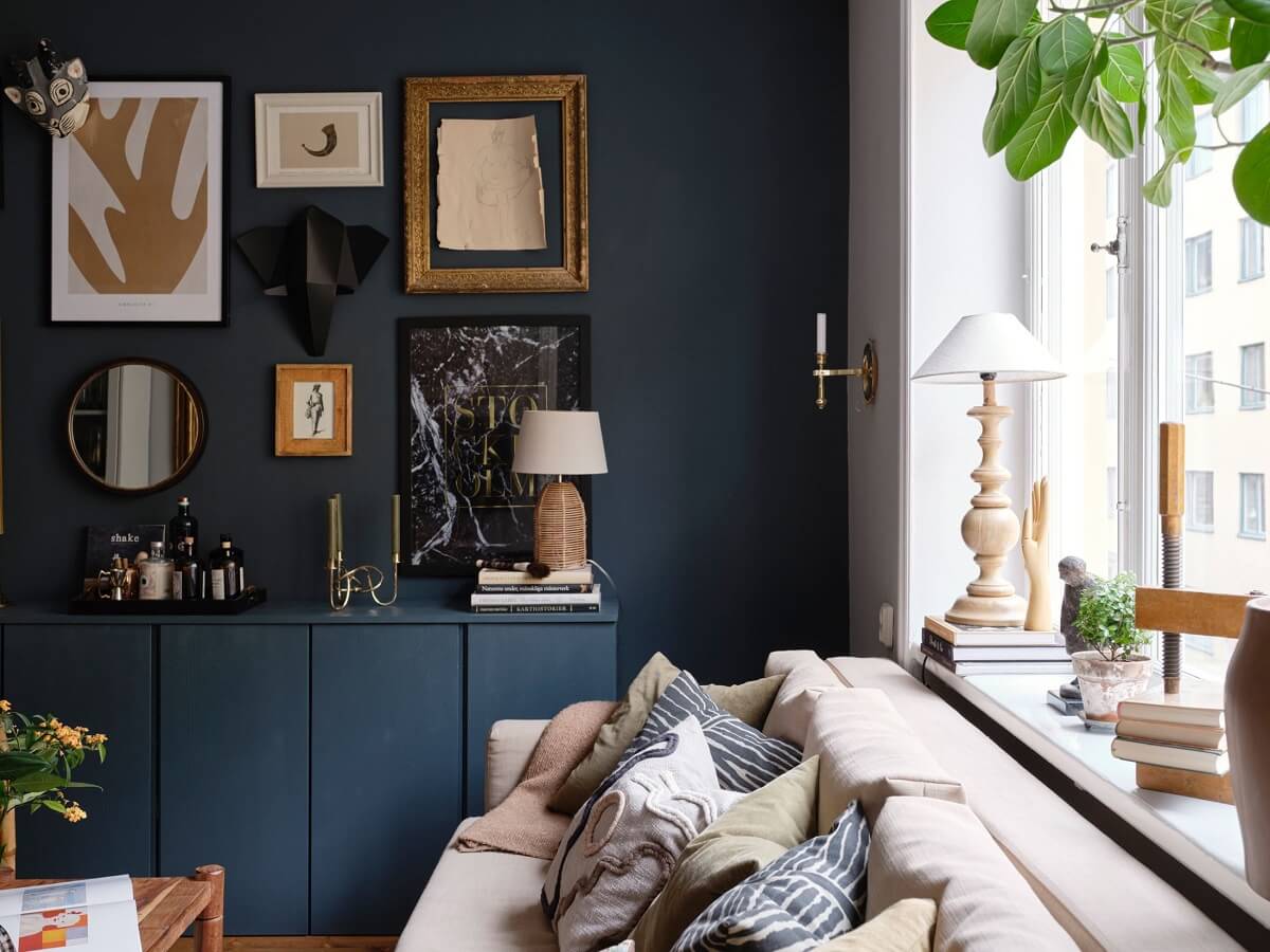 dark-blue-accent-wall-ivar-cabinets-gallery-wall-nordroom
