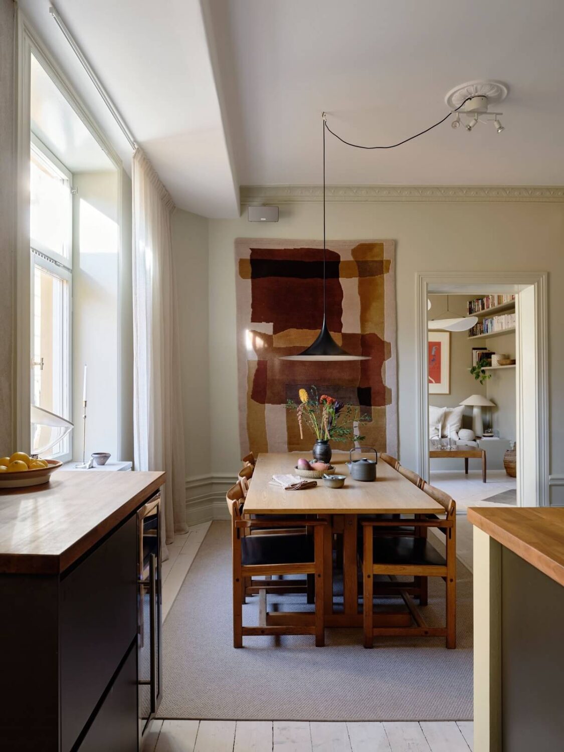 dining-room-black-kitchen-large-colorful-art-nordroom