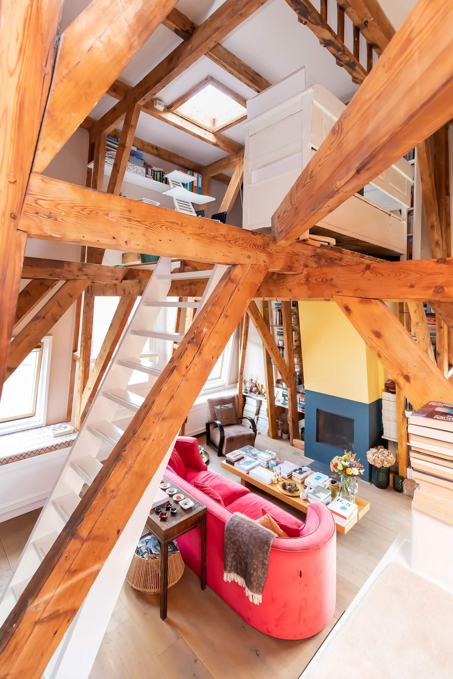 A Colorful Loft in Amsterdam with Exposed Wooden Beams