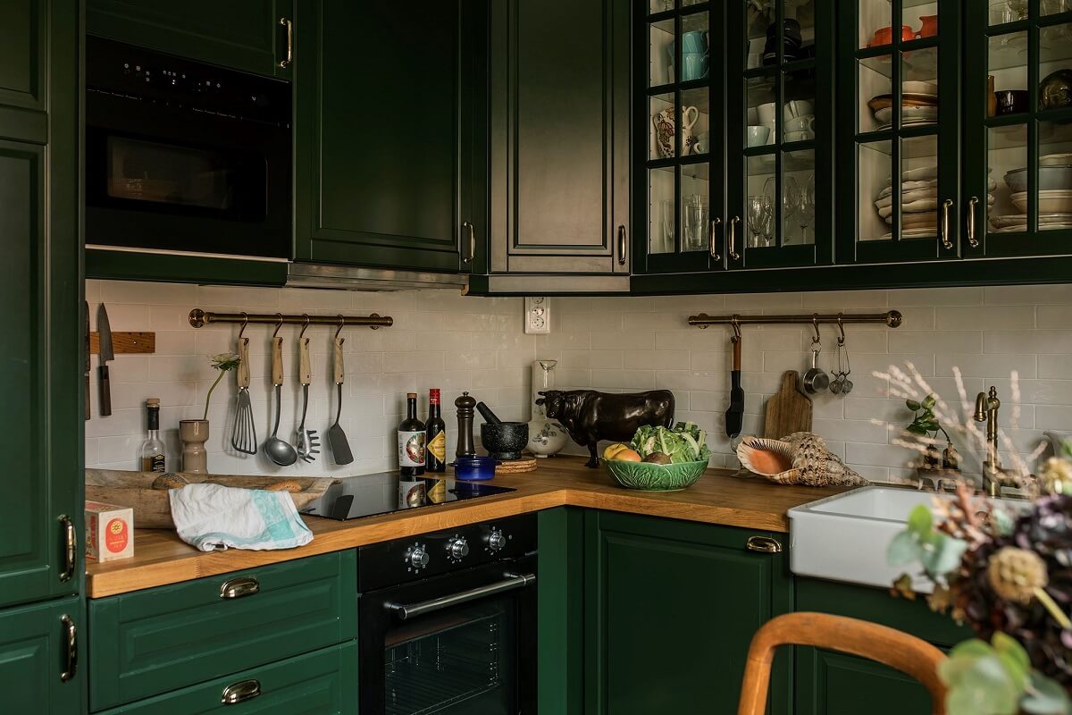 kitchen-green-cupboards-glass-upper-cabinets-nordroom