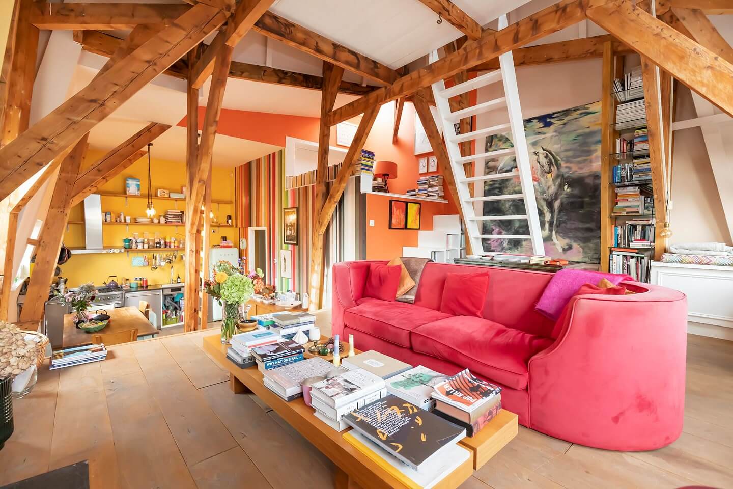 loft-apartment-amsterdam-exposed-beams-pink-couch-nordroom