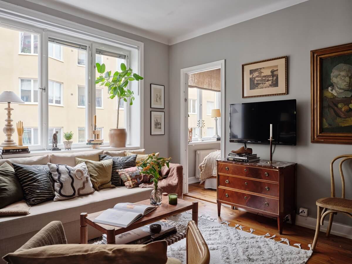 nordic-home-light-gray-walls-antique-dresser-large-rug-nordroom