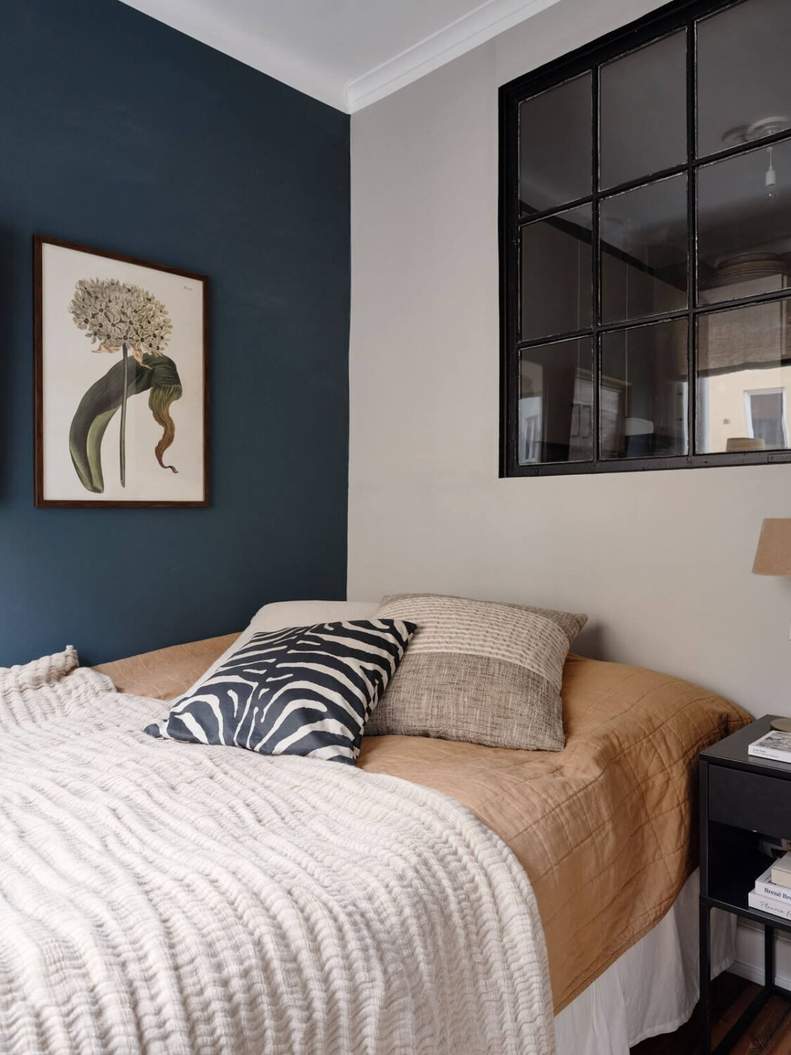 small-bedroom-dark-blue-accent-wall-indoor-window-nordroom