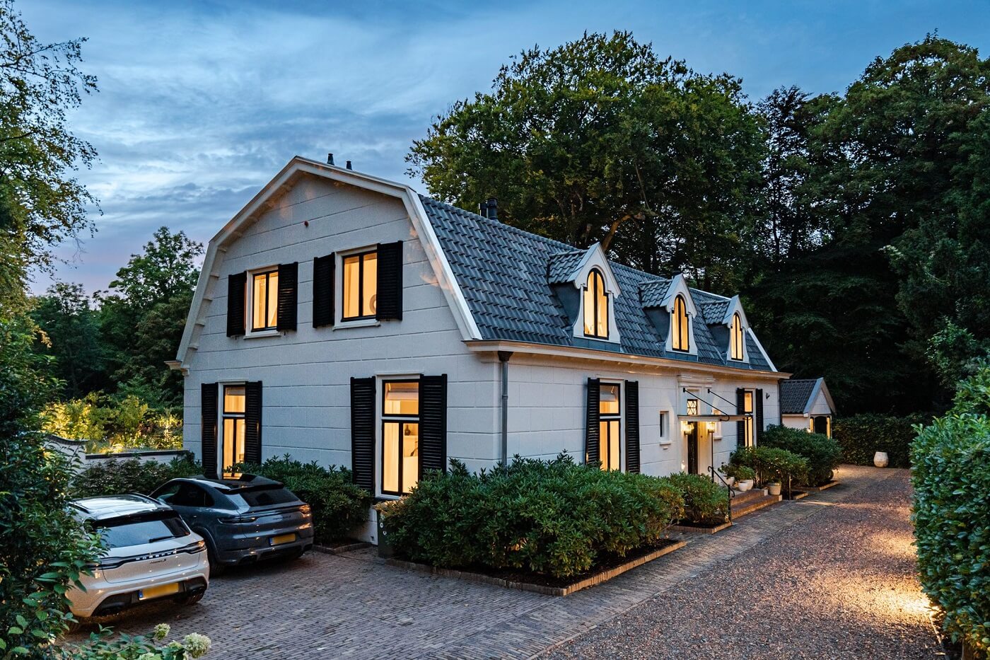 white-villa-former-carriage-house-at-night-nordroom