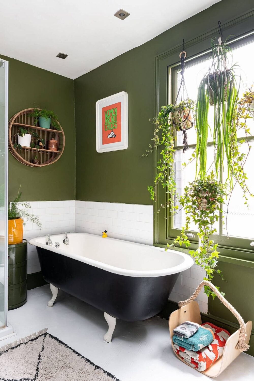 bathroom-green-walls-black-clawfoot-bath-plants-nordroom