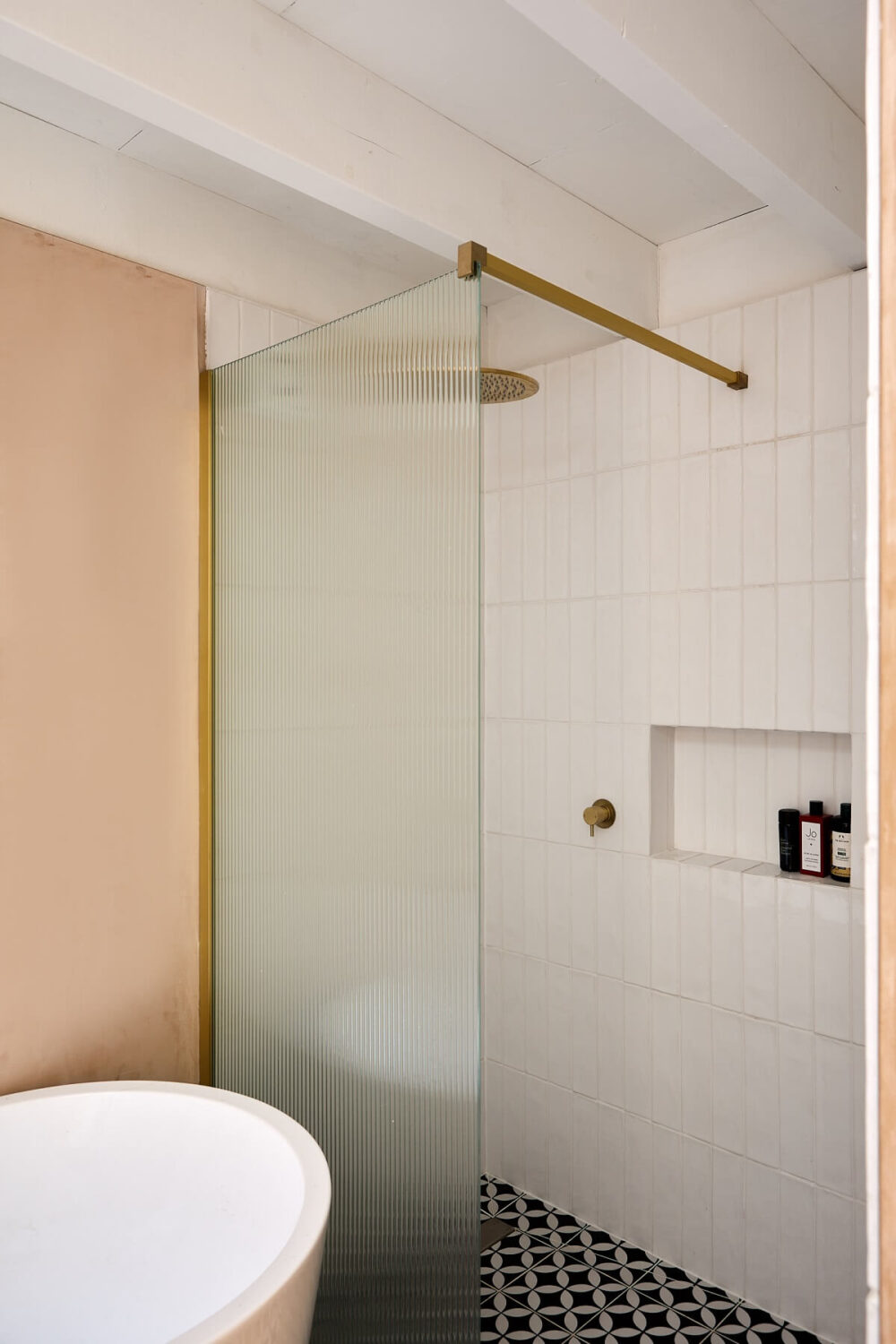 bathroom-shower-frosted-glass-wall-brass-fixtures-nordroom