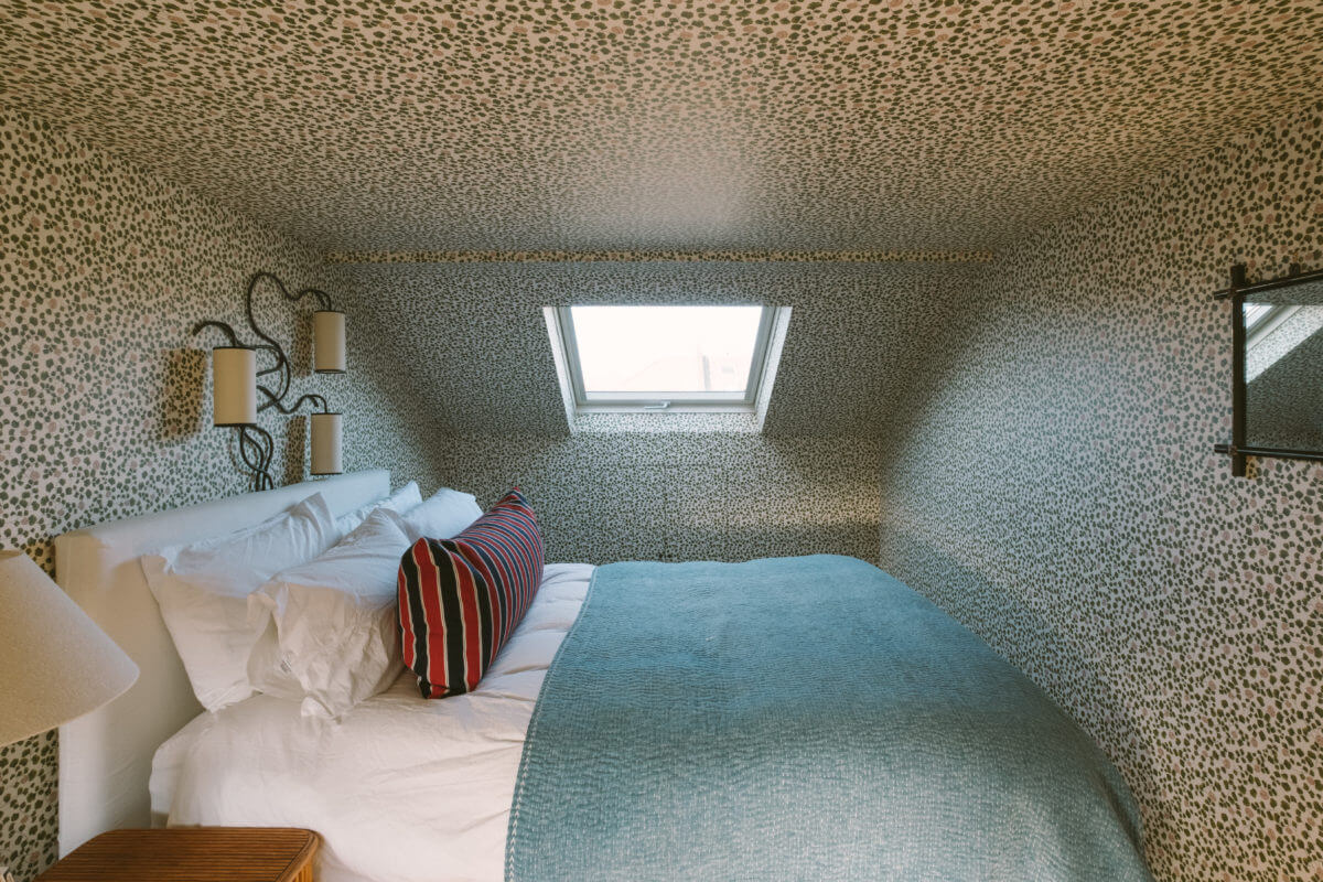 bedroom-wallpaper-slanted-ceiling-skylight-nordroom