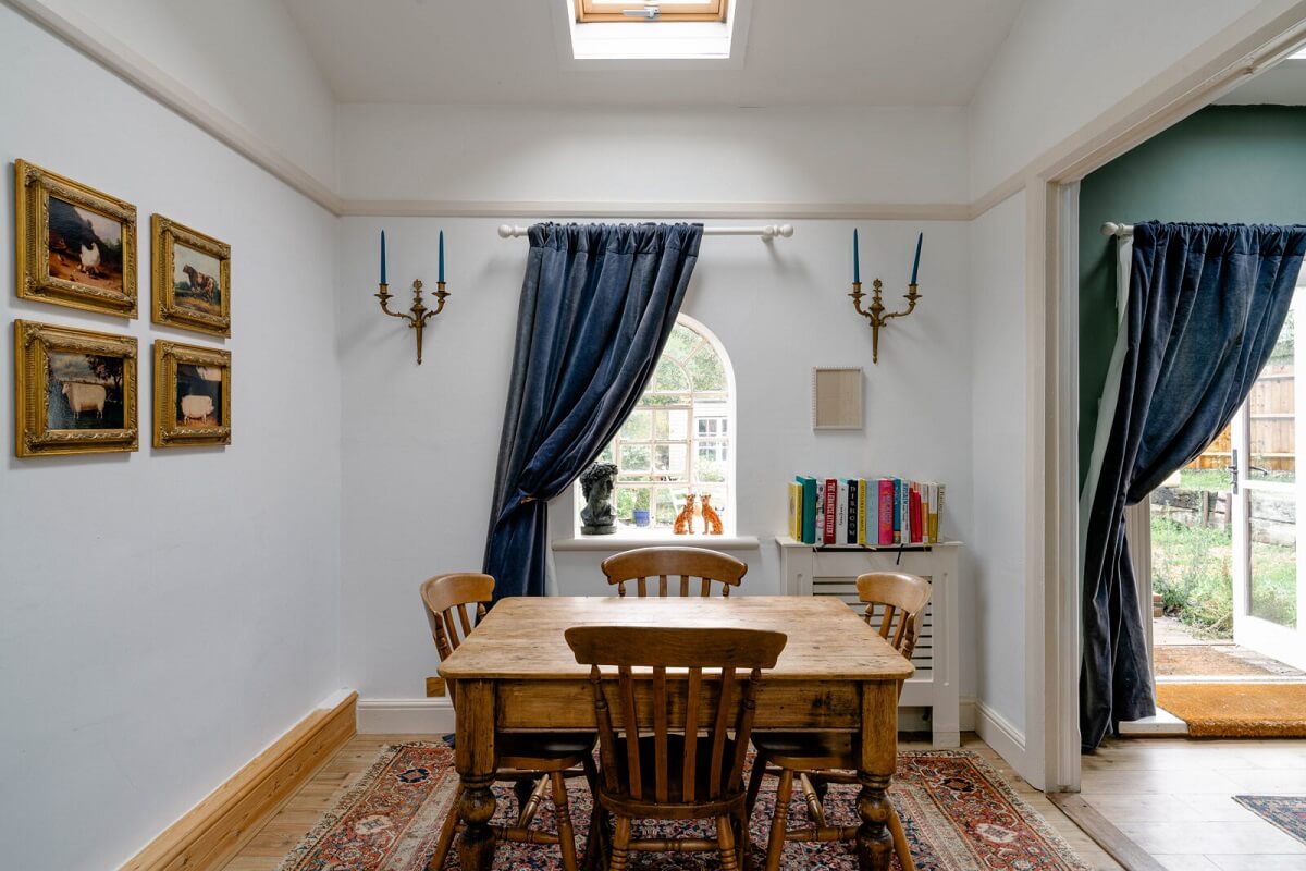 dining-room-blue-curtains-skylight-nordroom