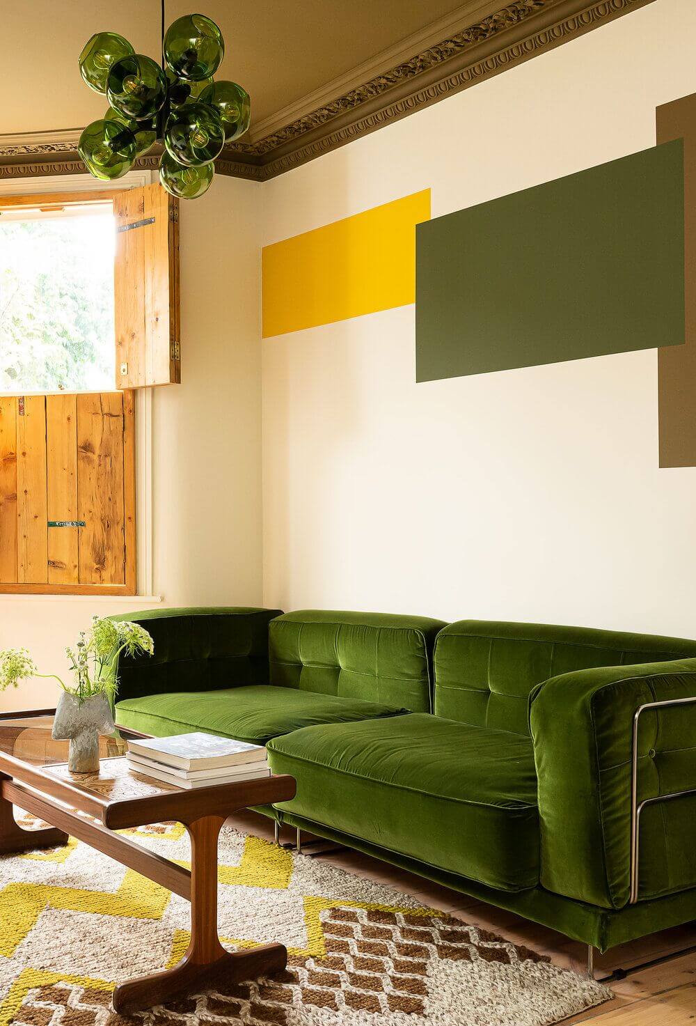 green-velvet-sofa-color-blocked-walls-olive-green-ceiling-nordroom