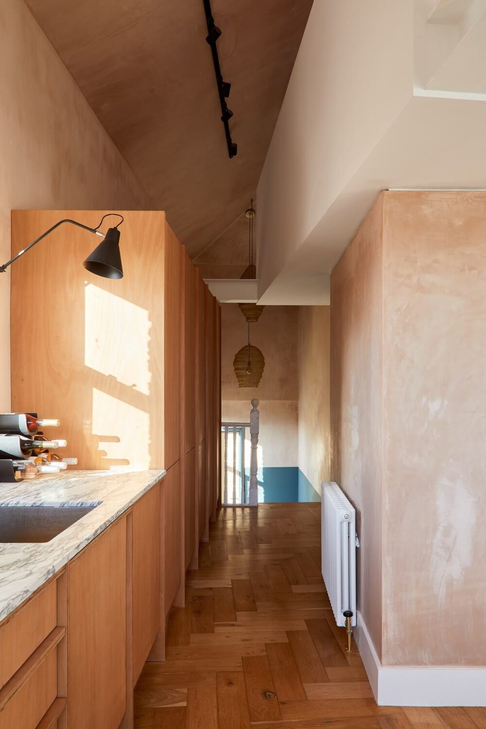 kitchen-herringbone-wooden-floor-plaster-pink-walls-nordroom