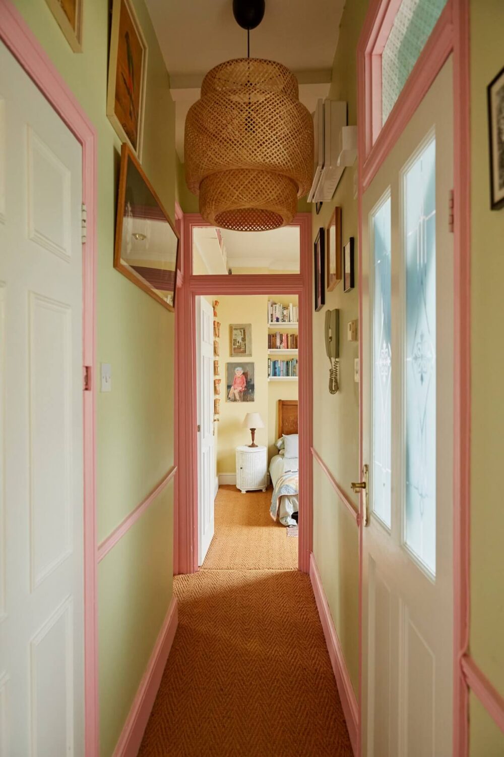 narrow-hallway-mint-green-walls-pink-trimmings-nordroom