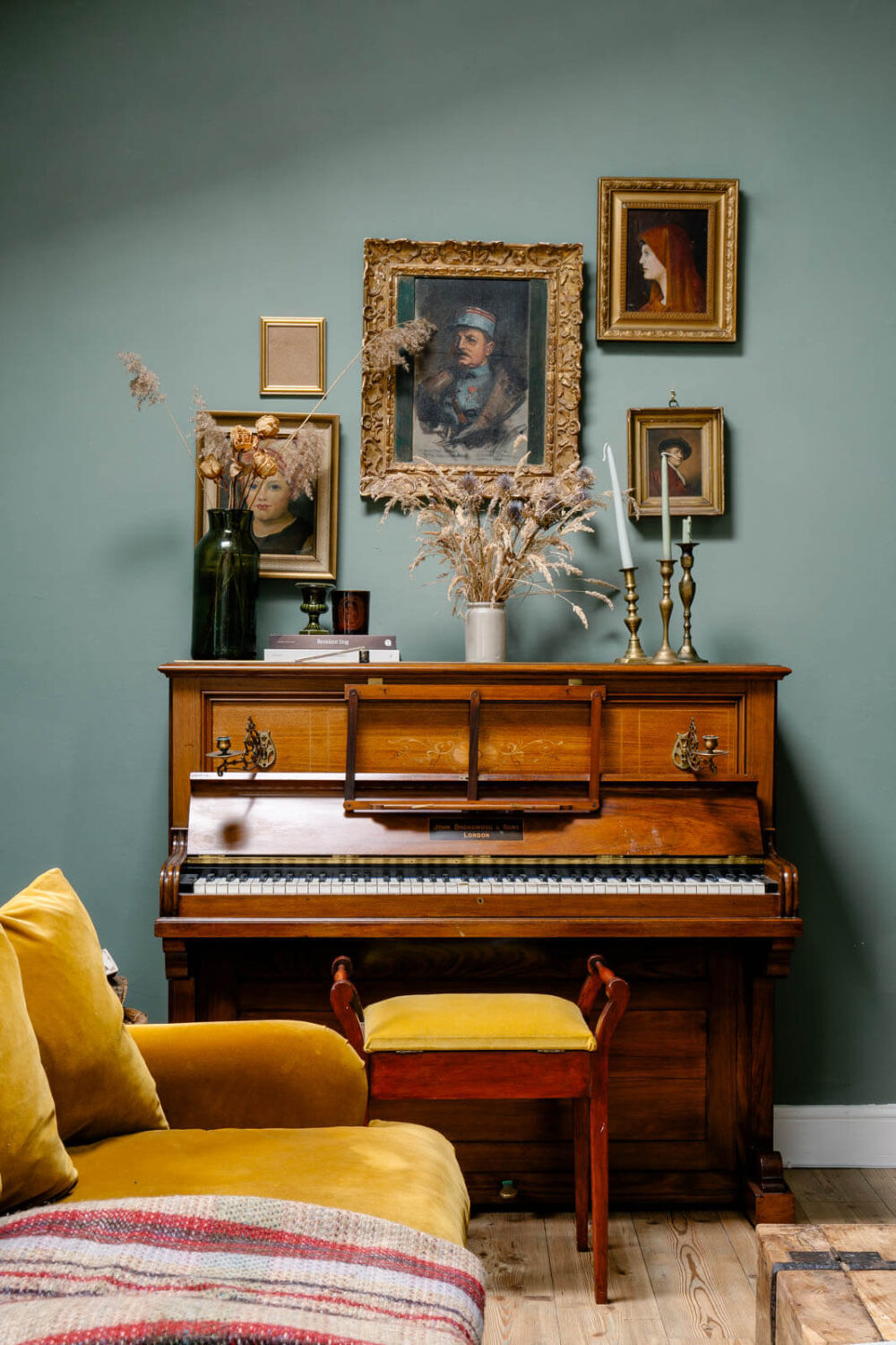 piano-vintage-art-green-walls-yellow-sofa-nordroom